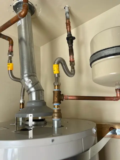 Water heater installation and plumbing repair in West End Market